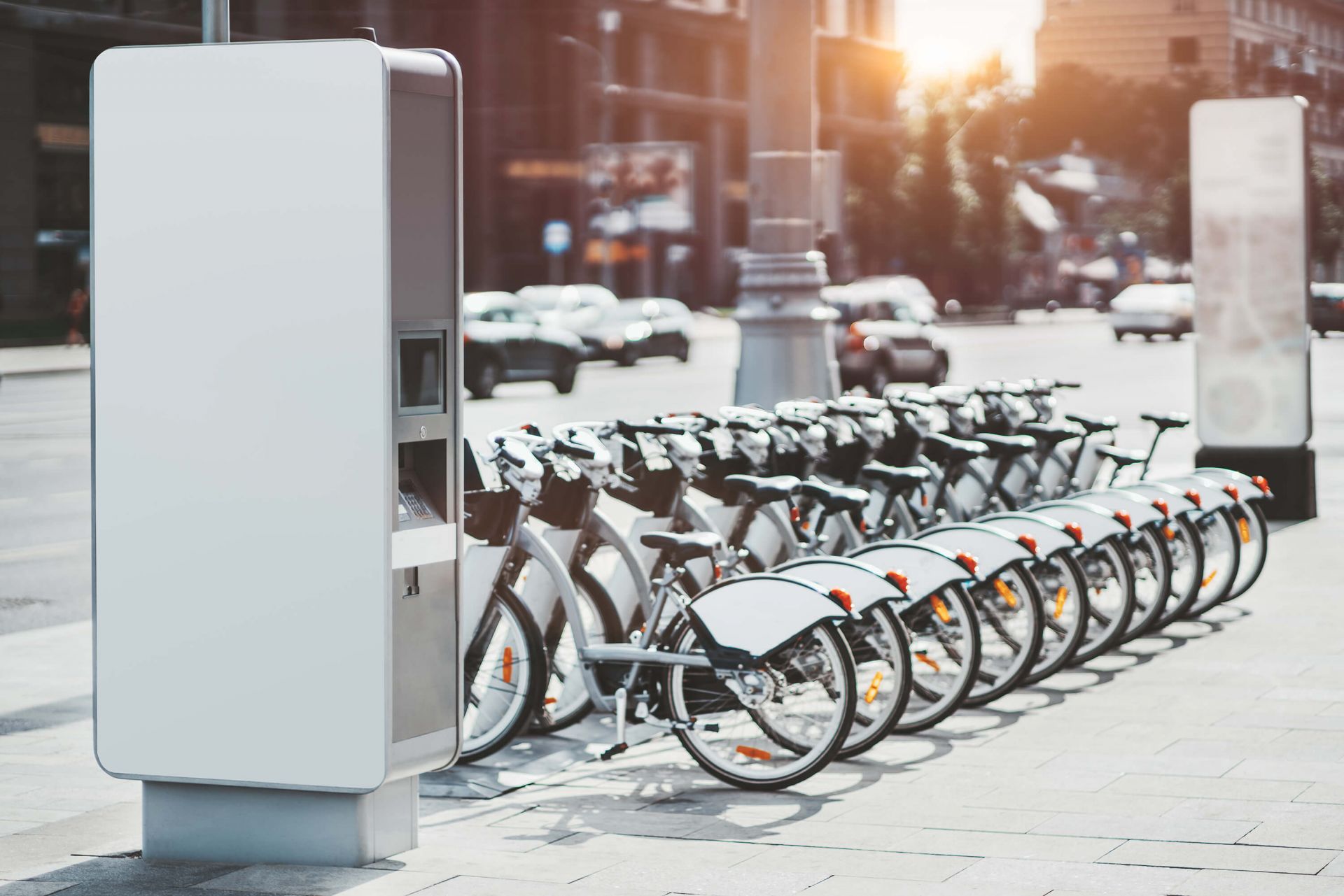 E-bikes parked near a modern city street
